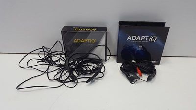 Two AdaptIQ headsets with different boxes